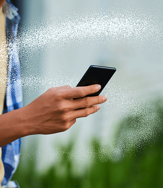 Illumia flow surrounding a person's hand holding a phone